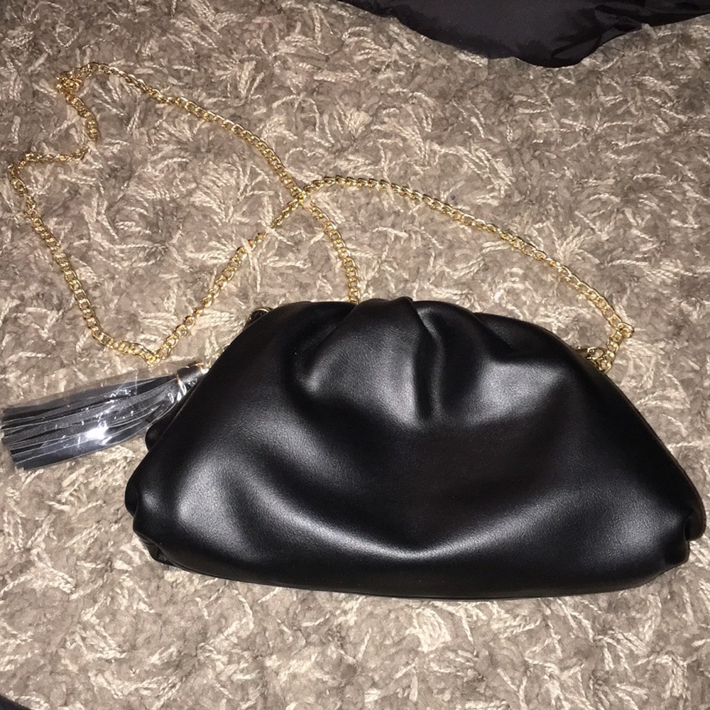 Brand new Understated Leather Black Clutch